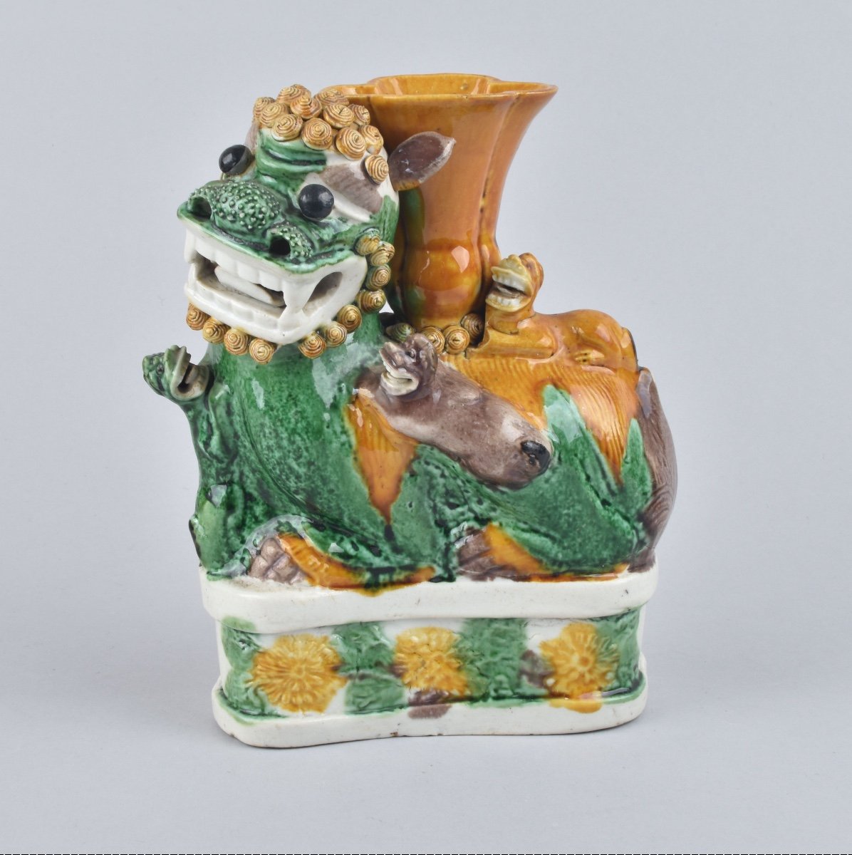 A Large Chinese Buddhist Lion Candleholder Decorated With Famille Verte. Kangxi Period