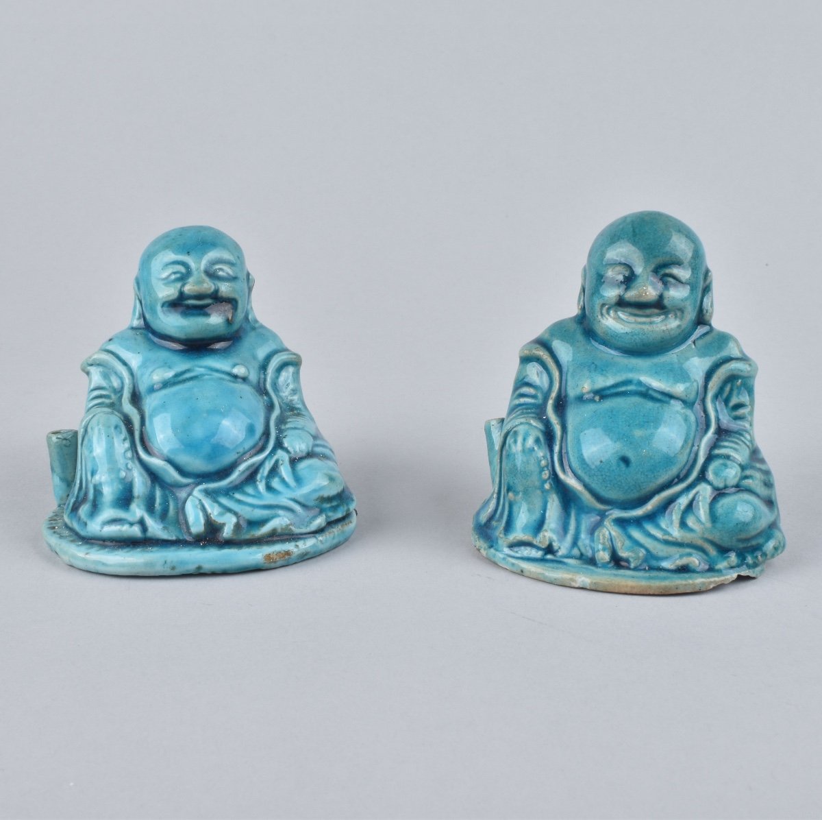 Two Chinese Turquoise-glazed Figures Of Budai. Kangxi Period