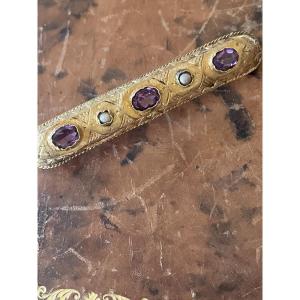 Broche ancienne en or 18 carats, améthystes et perles fines – XIXᵉ siècle