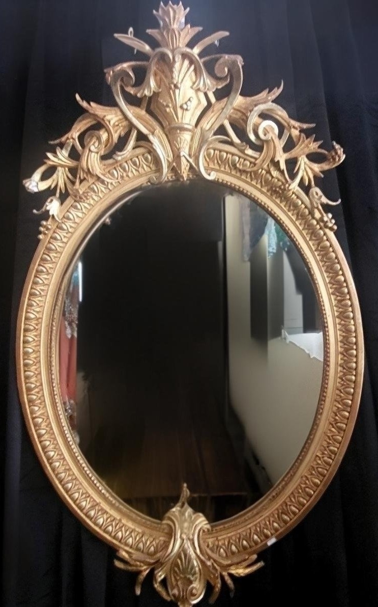 Miroir en bois doré ovale à fronton, époque Napoléon III, style Louis XVI