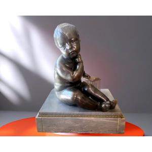Bronze de grande taille "l'enfant à la cage" sur marbre d'après Jean-Baptiste PIGALLE - XIXeme