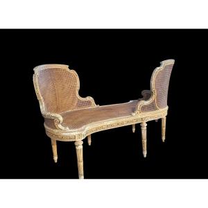 Confident en bois sculpté et cannage, style Louis XVI- xixeme 