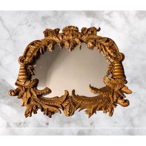 Miroir en bois doré de style baroque d époque XIXeme 