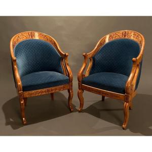 Paire de fauteuils gondoles d'époque Charles X en érable moucheté