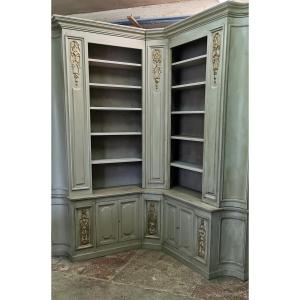 Corner Bookshelf With Wood Paneling 