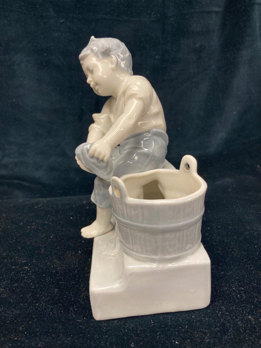 Porcelain Boy Figurine Washing His Feet-photo-1