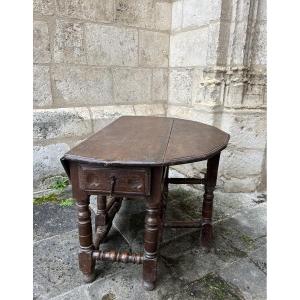 Round Drop-leaf Table From The 18th Century
