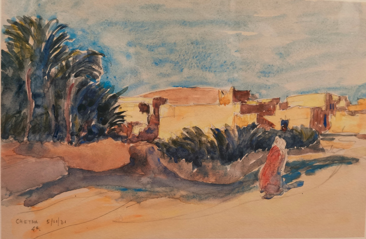 CHETMA , personnage marchant dans le paysage