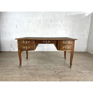Bureau double face de style Louis XV en noyer, fileté de laiton et orné de bronzes dorés