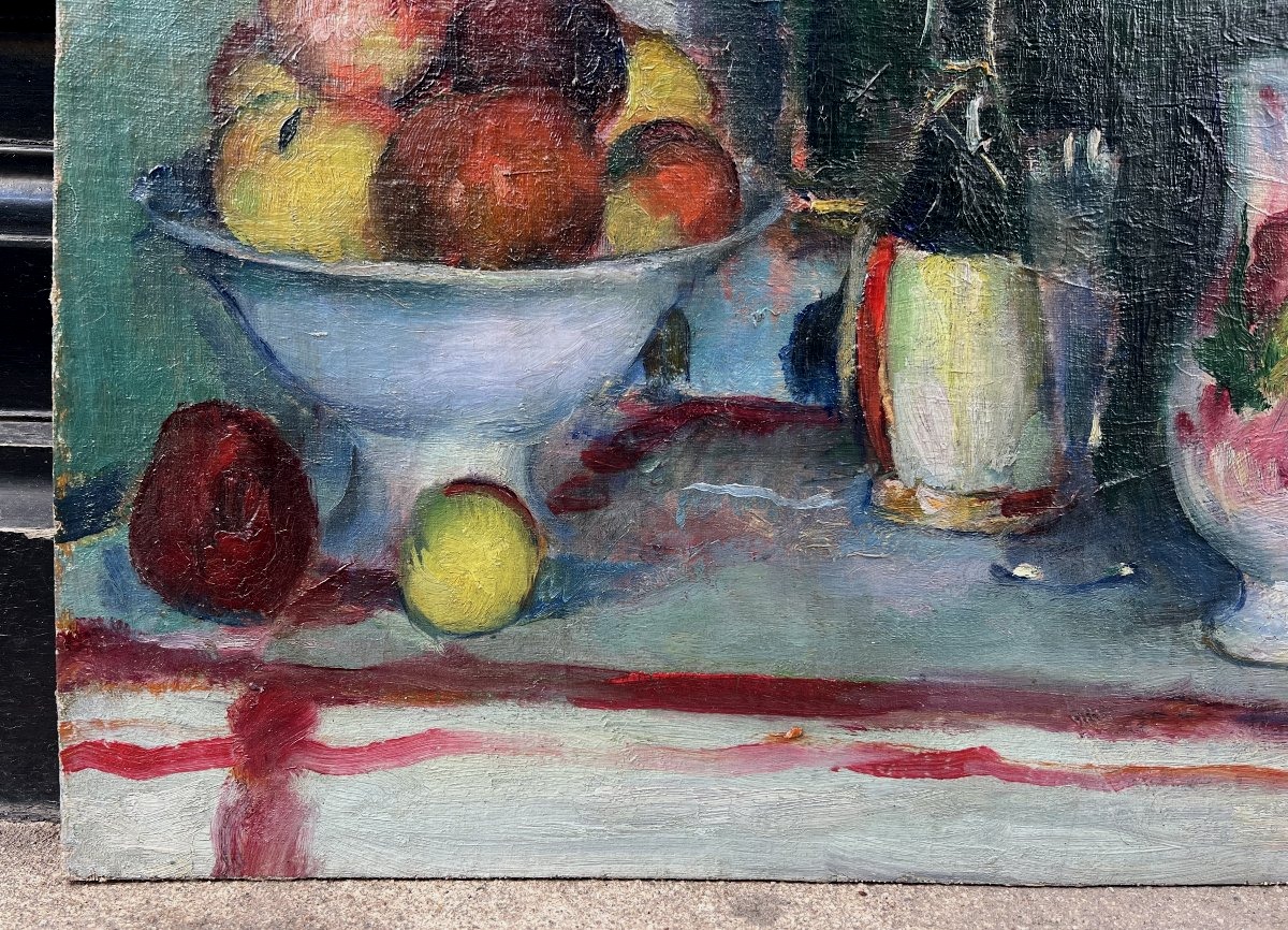 Henri Ottmann (1877-1927). Pommes, bouteille et vase fleuri. Huile sur toile marouflée, signée.-photo-1