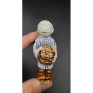 Netsuke - Karako With Shishi Mask - Porcelain - Late 19th Century