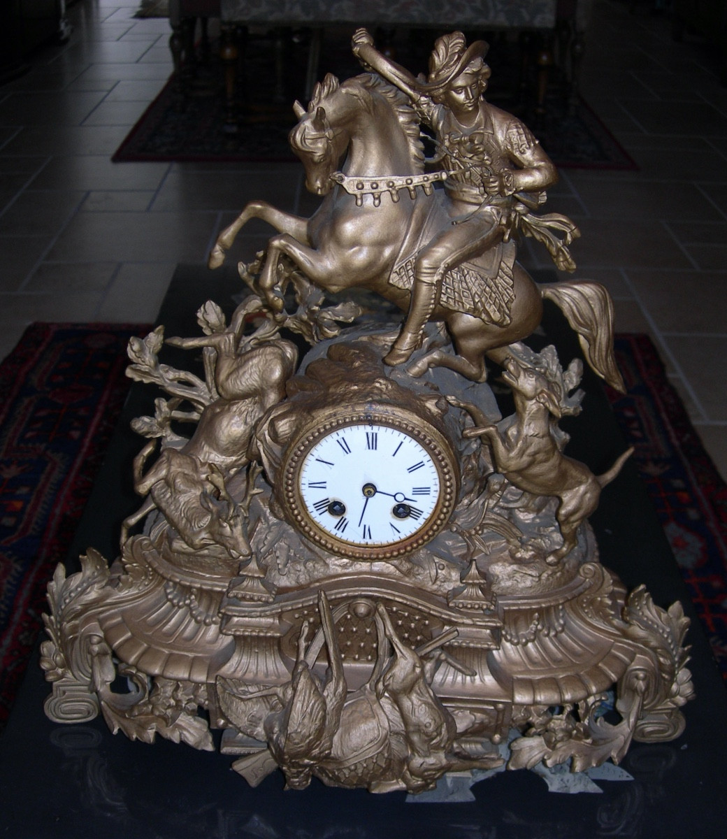 Large Antique Clock In Gilded Regula From The Late 19th Century, Depicting A Horse Stag Chase.