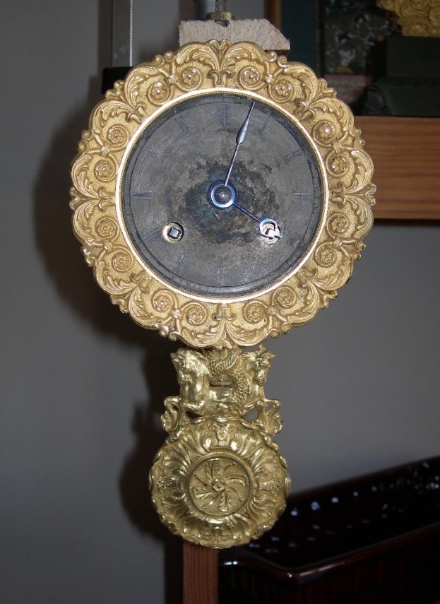 Antique Period Pendulum Clock Movement, Restored Or From The Charles X Era, In Gilded Bronze With A Pendulum