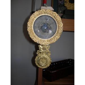 Mouvement ancien de pendule d'époque restauration ou Charles X  en bronze doré avec balancier