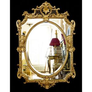 Mirror With Wooden Indian Heads And Gilded Stucco, Late 19th Century, Circa 1880