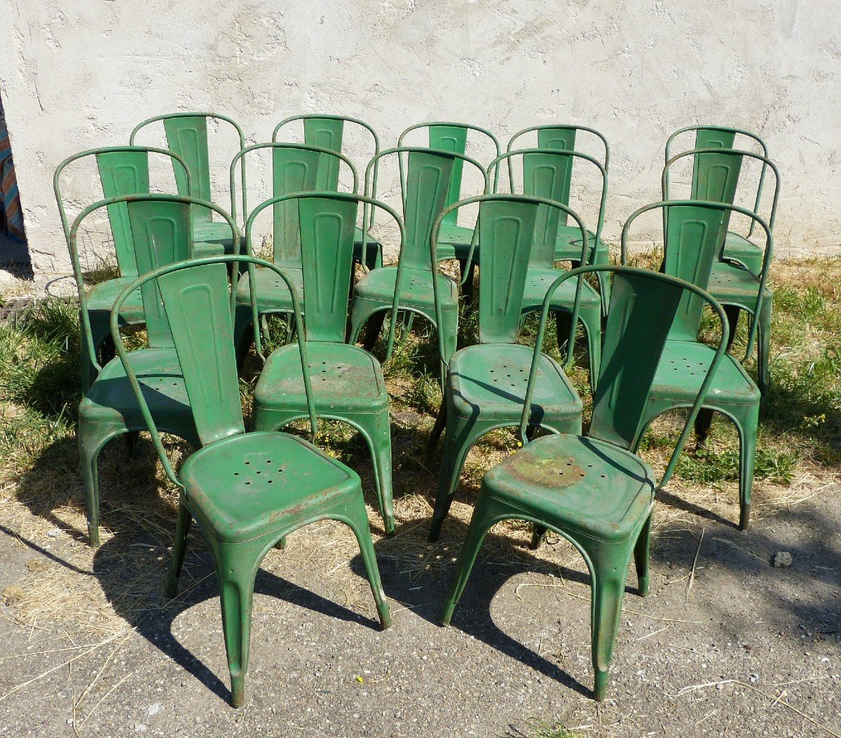 Series Of 16 Tolix Metallic Chairs