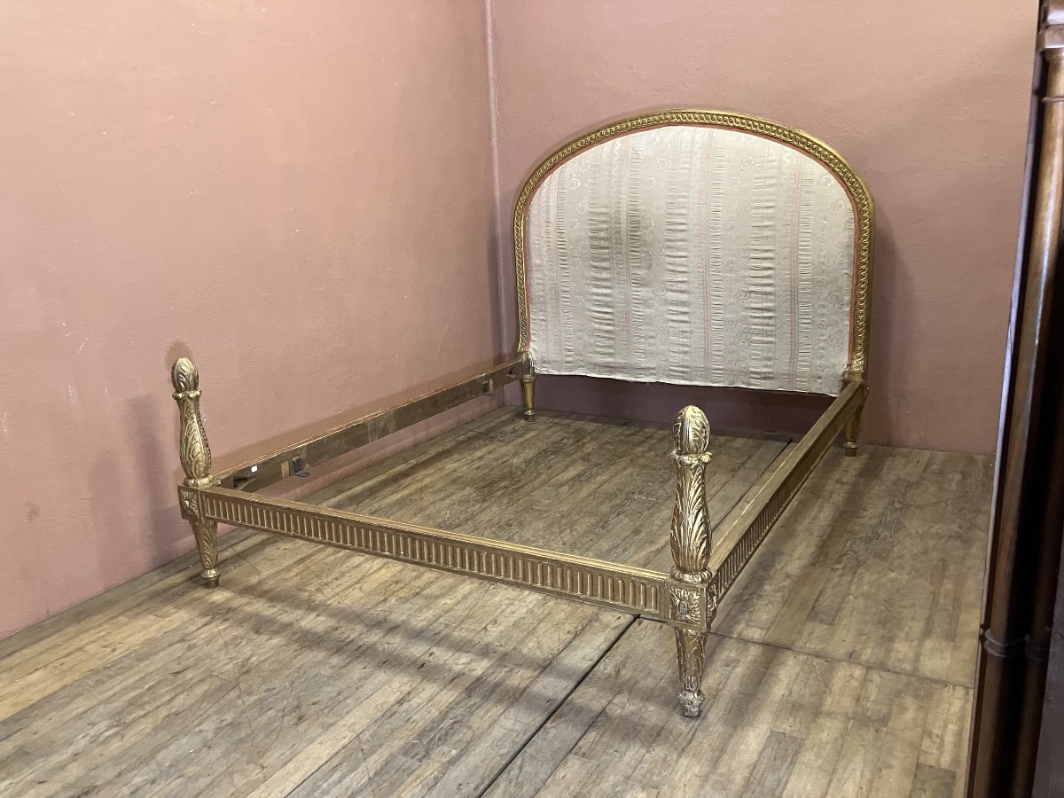 Grand lit en bois doré Louis XVI époque 19ème 