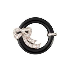 Broche en platine, Onyx noir et diamants vers 1920