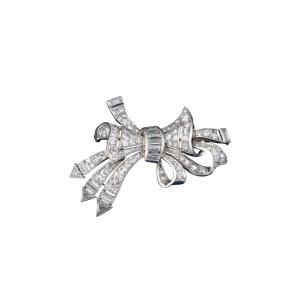 Broche Noeud en or et diamants, année 1930
