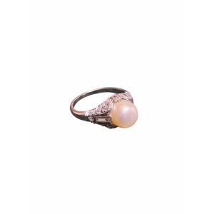 Bague Art Déco en platine, diamants et perle fine