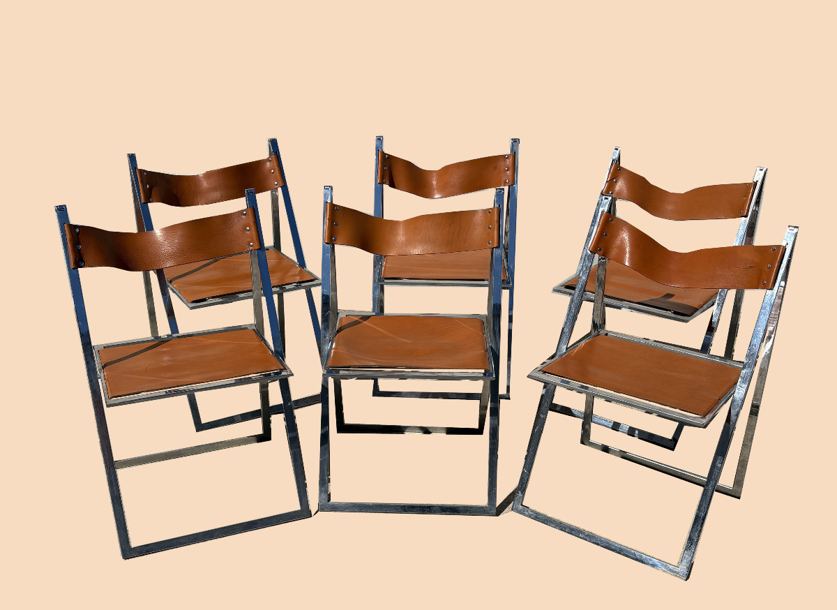 Suite de 6 chaises pliantes en métal chromé et cuir, circa 1970