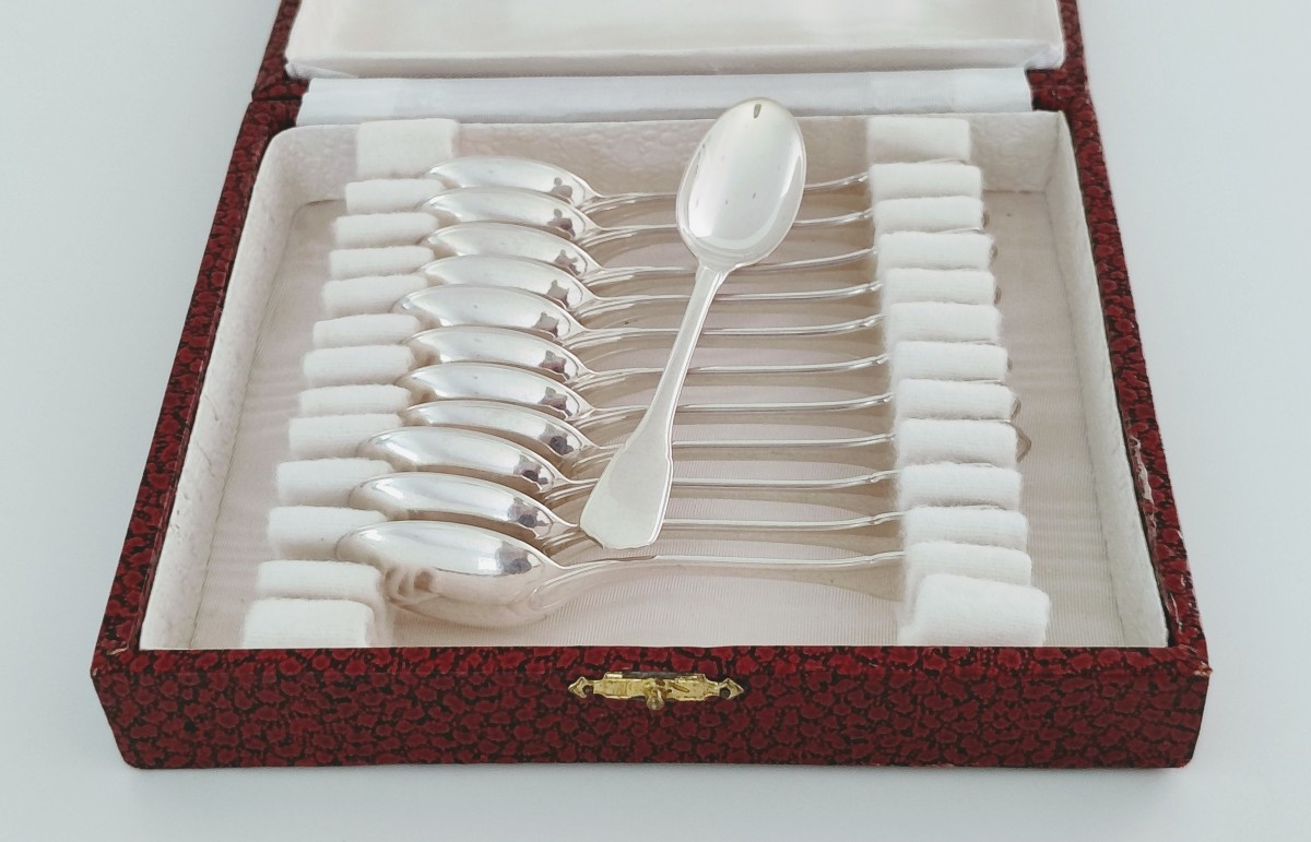 Douze cuillères à moka art deco en argent massif 