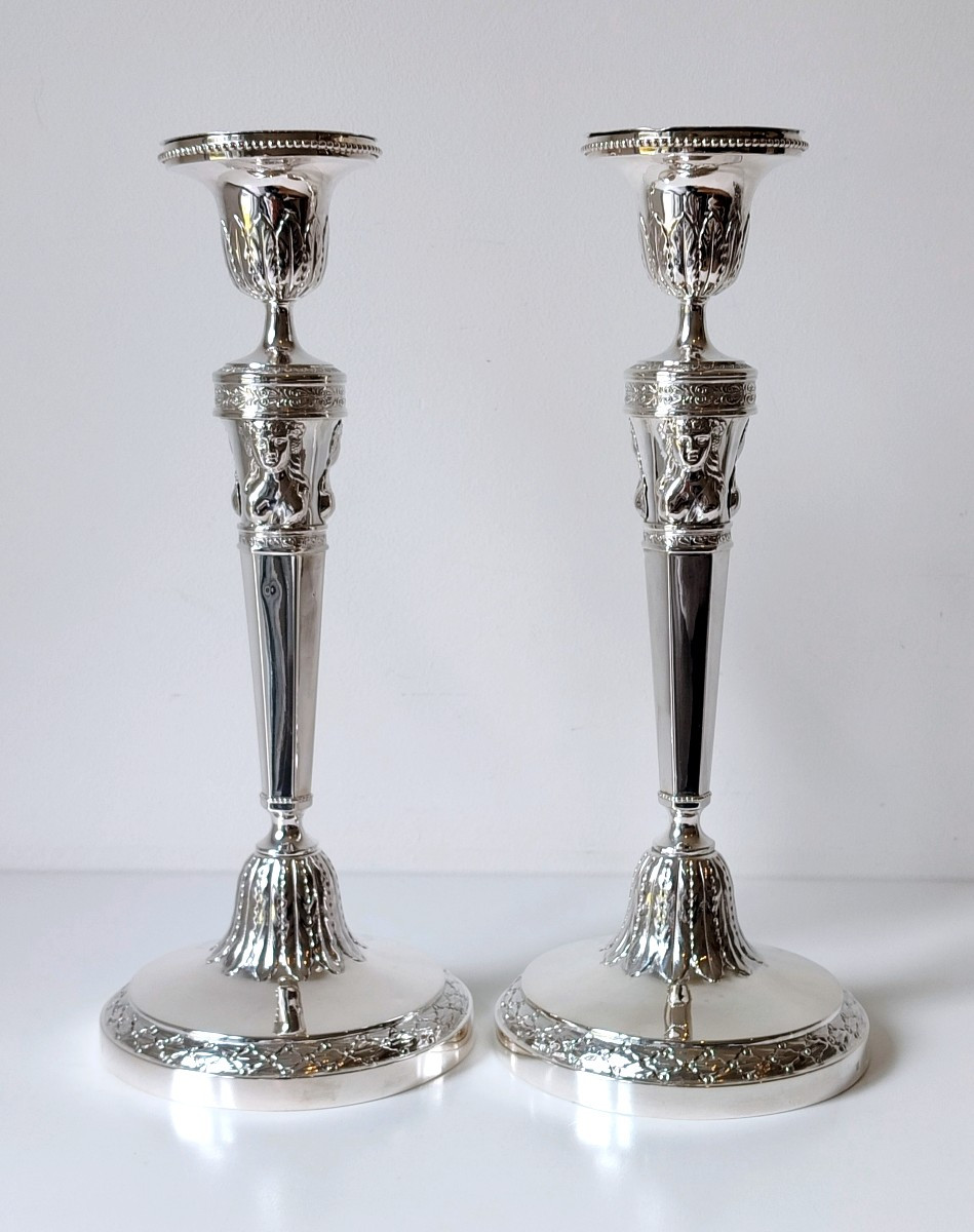Une paire de bougeoirs empire en argent massif Liège 