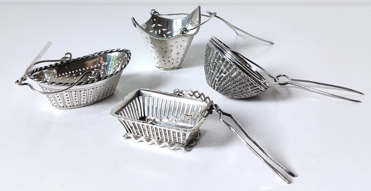 Four Empire Tea Strainers In Sterling Silver