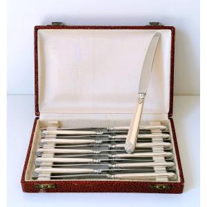 Twelve Solid Silver Dessert Knives