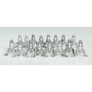 Eight Solid Silver Knife Rests 