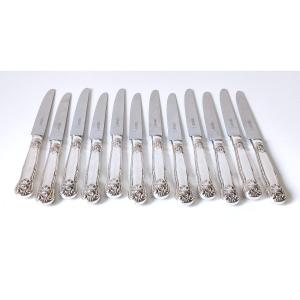 Douze couteaux de table en argent massif Garrard & Co 