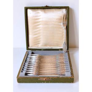 Douze fourchettes à gâteau en argent massif 