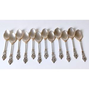 Twelve Solid Silver Coffee Spoons 