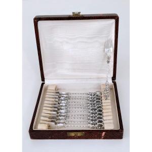 Twelve Solid Silver Cake Forks
