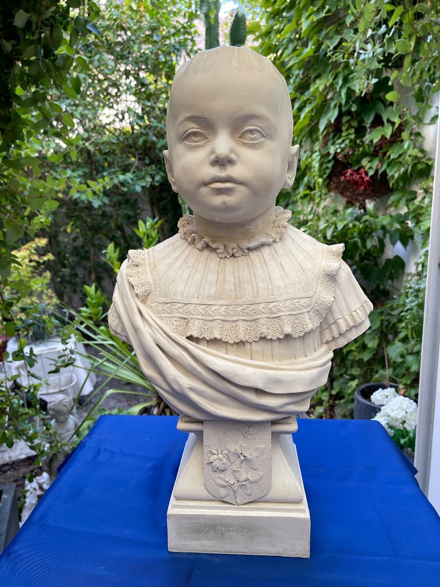 A Plaster Bust Depicting A Young Child From The 19th Century