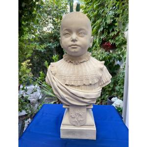A Plaster Bust Depicting A Young Child From The 19th Century