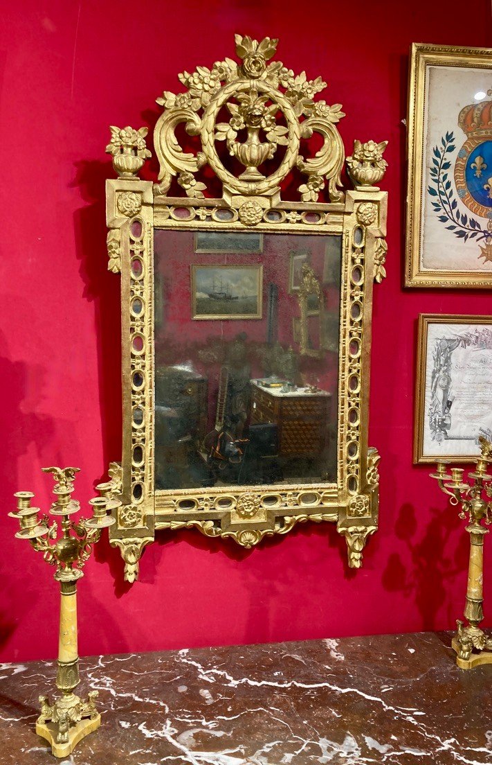 Mirror With Openwork Pediment In Re-gilded Wood With Carved Flower Vase Patterns. 18th Century Period