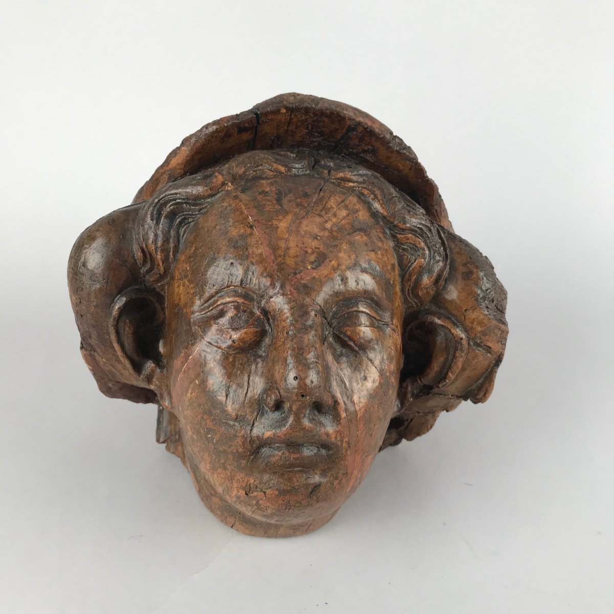 Head Of A Woman In Carved Wood From The XVIth Century