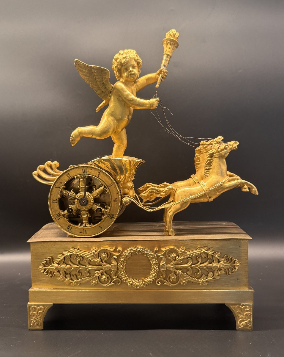 Pendule Empire "Char de l'Amour" en bronze doré - Cupidon