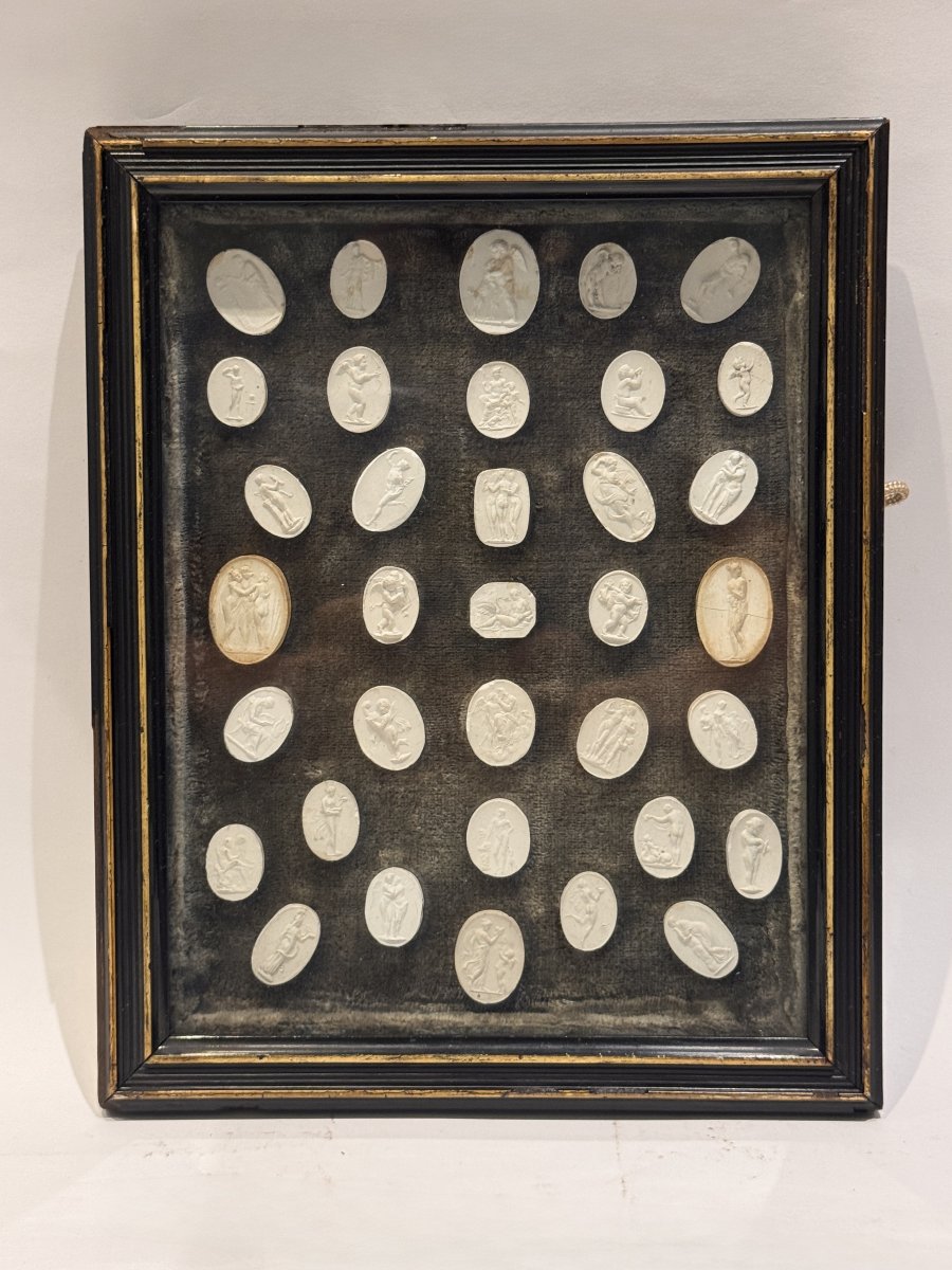 Collection Of Intaglio Prints From The Grand Tour Of The Late 18th Century, In A Blackened Wooden Frame