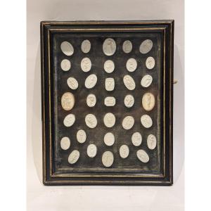 Collection Of Intaglio Prints From The Grand Tour Of The Late 18th Century, In A Blackened Wooden Frame