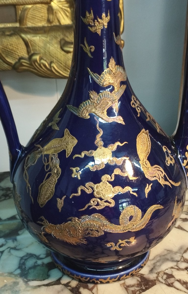 Verseuse en porcelaine bleue, dorures et décor oriental-photo-1
