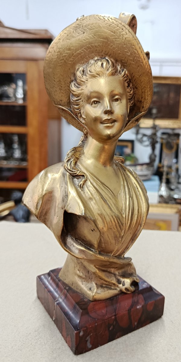 Woman In A Golden Bronze Hat By S. Kinsburger 