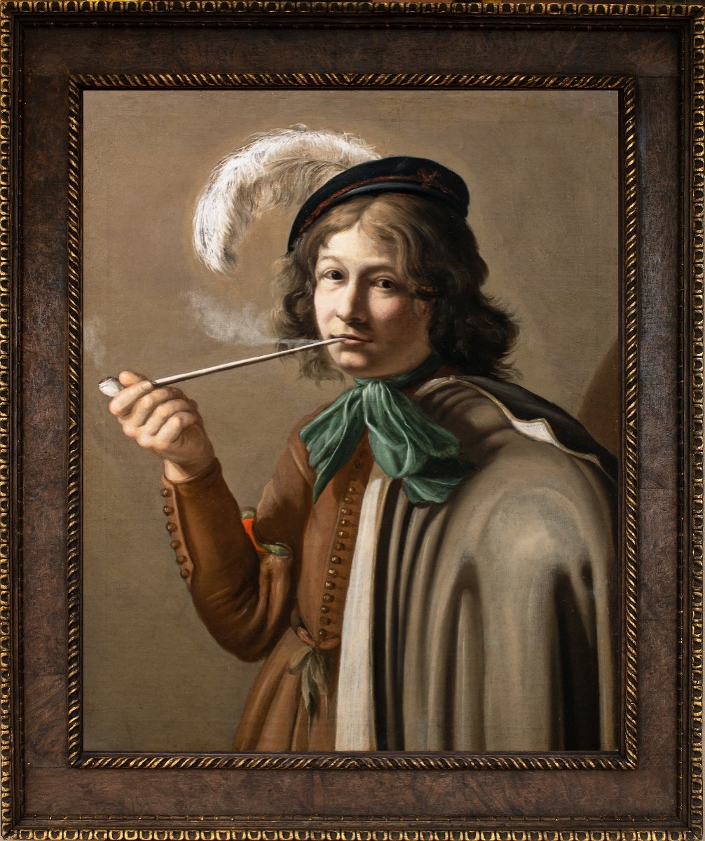 Jeune homme au béret fumant la pipe. Ecole Caravagesque nordique du XVIIème Siècle
