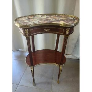 Table de salon  acajou bronzes dorés  époque XIXe siècle 