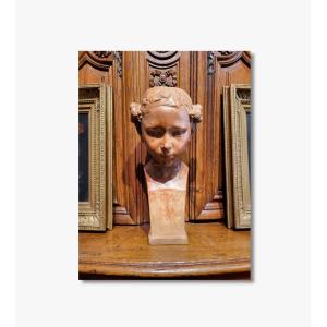 Buste de femme en terre cuite par Eugène PIRON