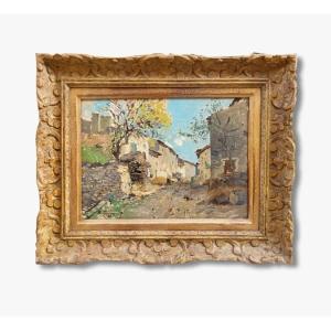 Une huile sur carton , Vue de village par Edmond PETITJEAN