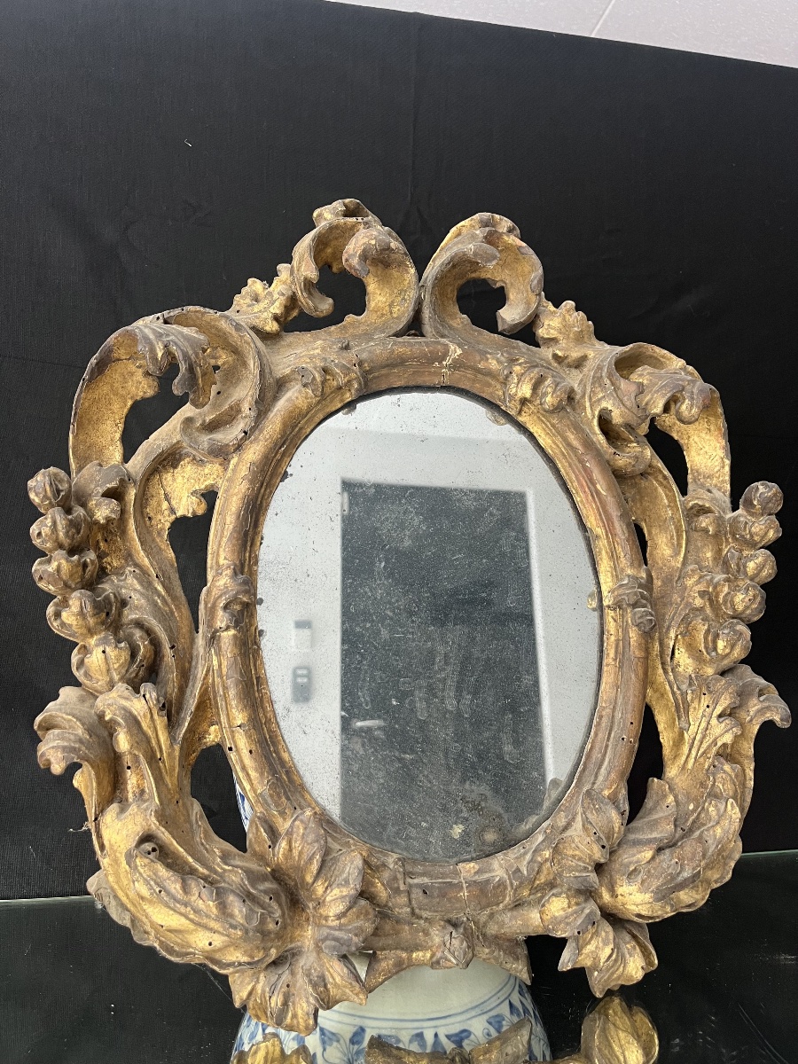 Petit miroir d’entrée en bois dorée XVIIIéme
