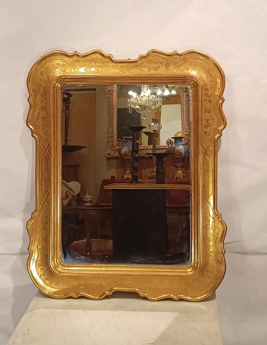 MIROIR EN BOIS DORÉ ET GRAVÉ DÉBUT DU 20ème SIÈCLE