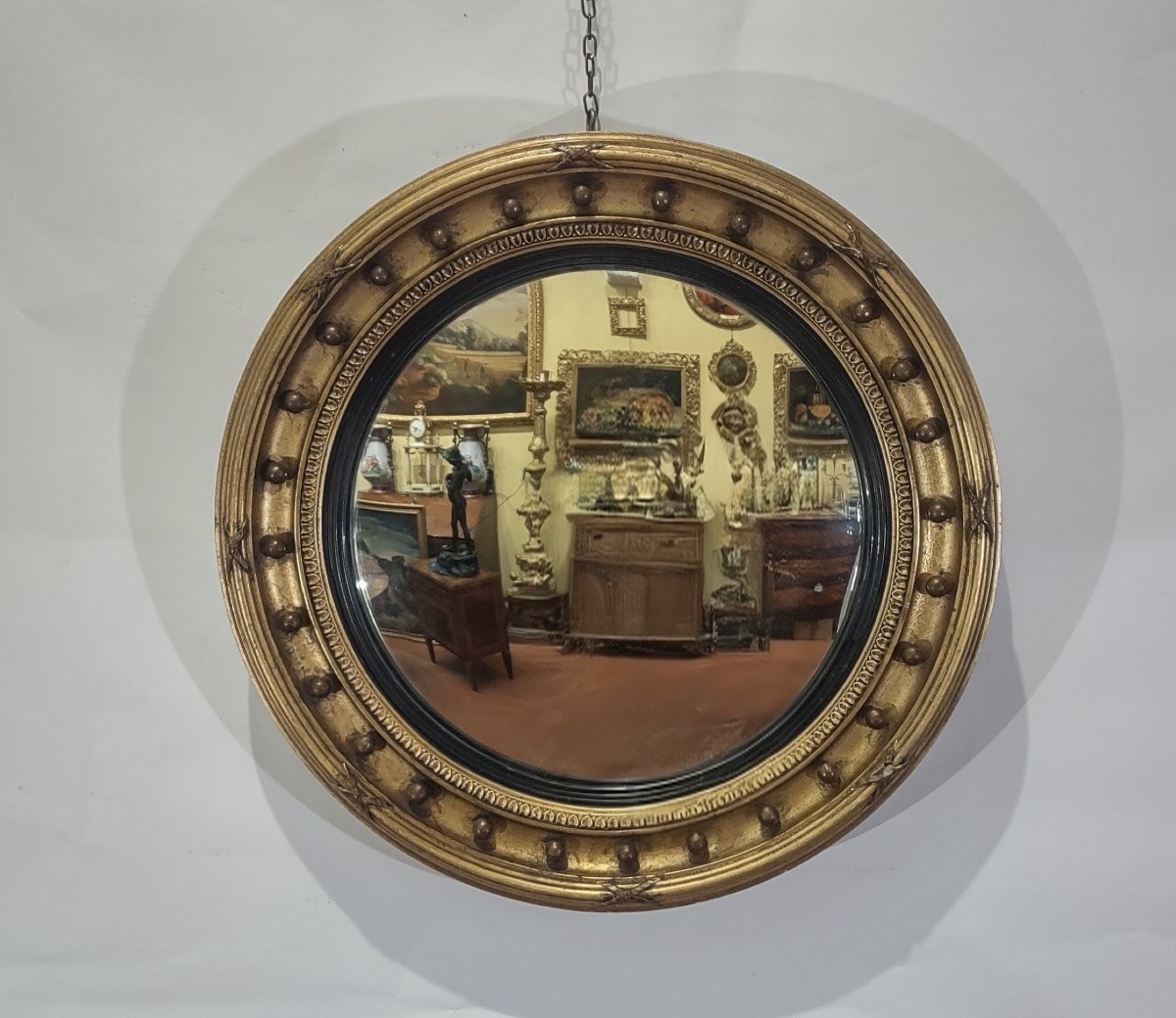 19th Century Curved And Gilt Mirror